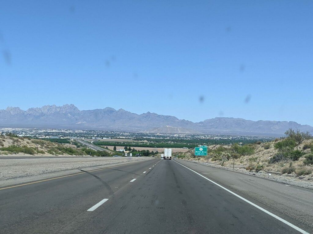 A picturesque landscapes near Las Cruces with sprawling fields and mountainous backdrops